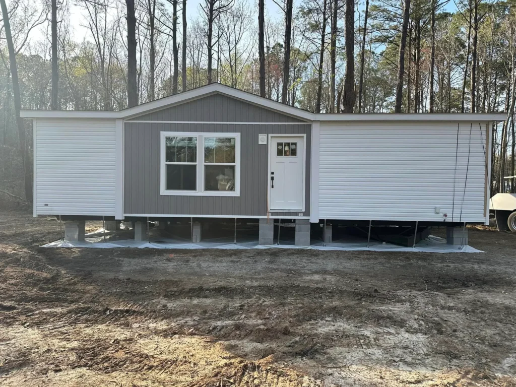 Single-wide mobile home set on blocks